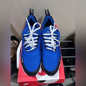 Blue and black Nike shoes